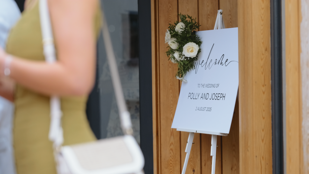 Personalised wedding sign at The Little Green Wedding Barn captured by a Norfolk wedding videographer