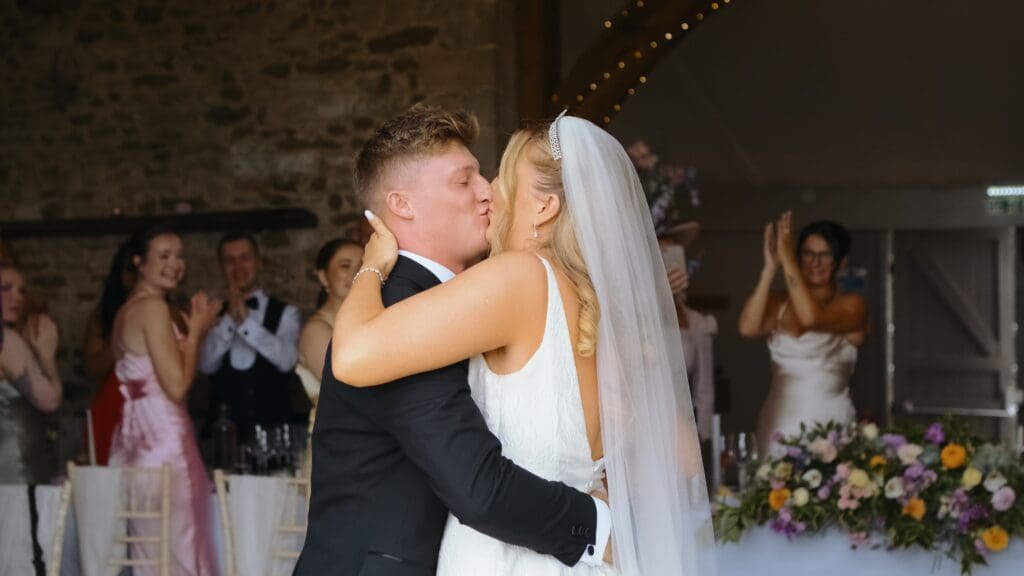 Bride and groom entrance into wedding breakfast at pentney abbey