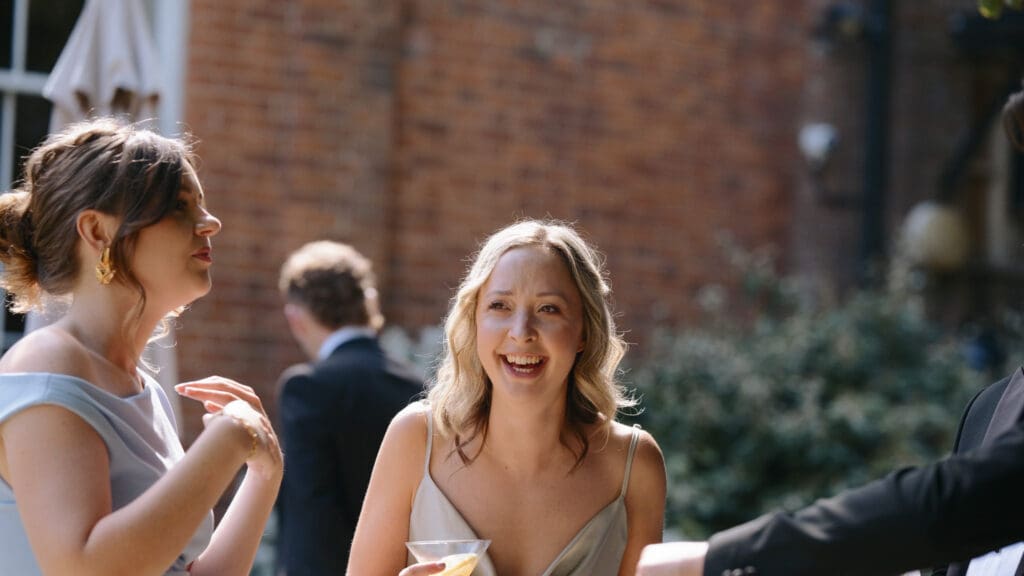 Wedding guest laughing assembly house in Norwich