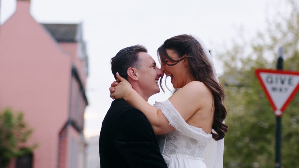 Bride and groom embracing in Norwich