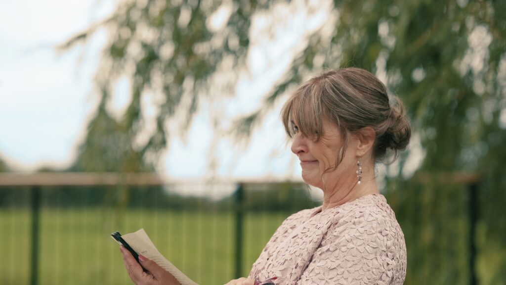 mother of the bride reading at wedding ceremony in norfolk