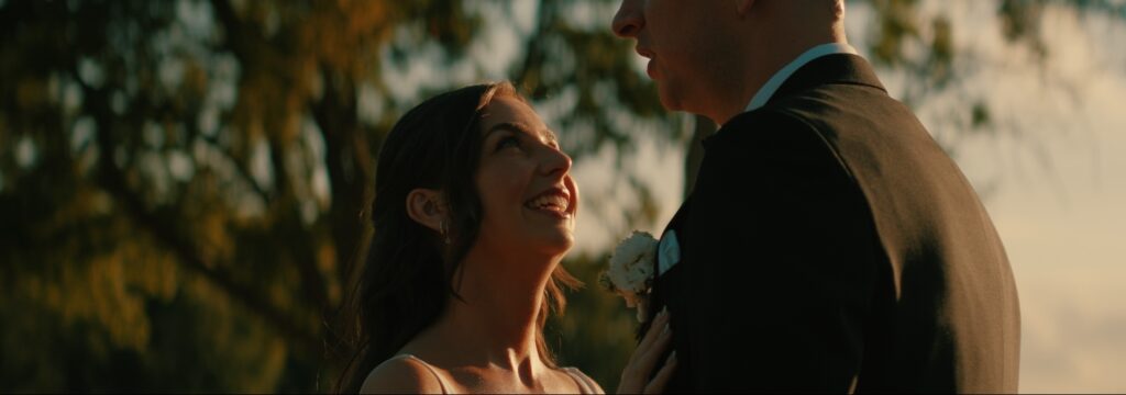 Bride and groom at golden hour outside Reymerston Hall Norfolk Wedding