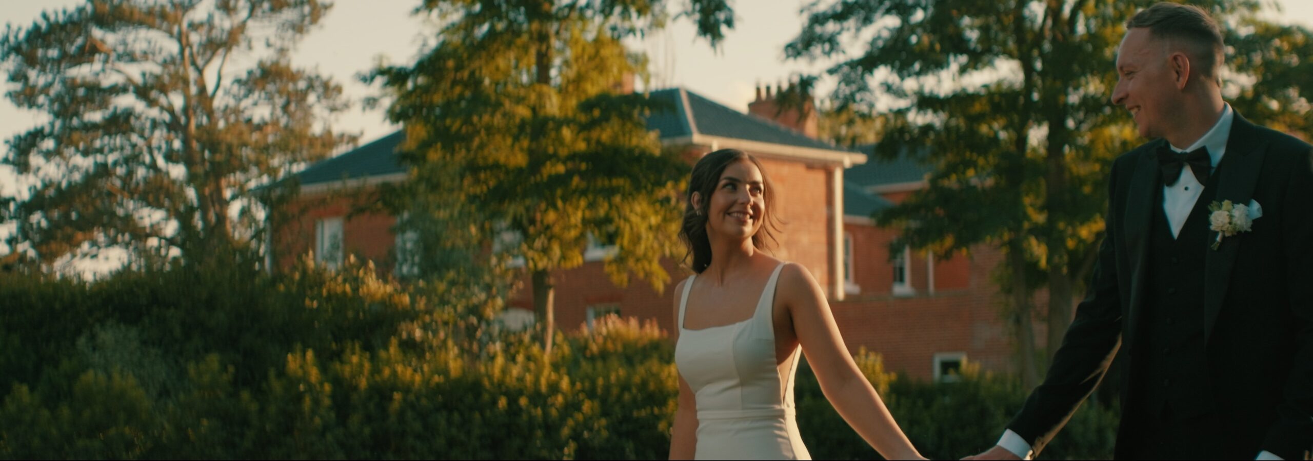 Bride and Groom golden hour outside Reymerston Hall Norfolk wedding