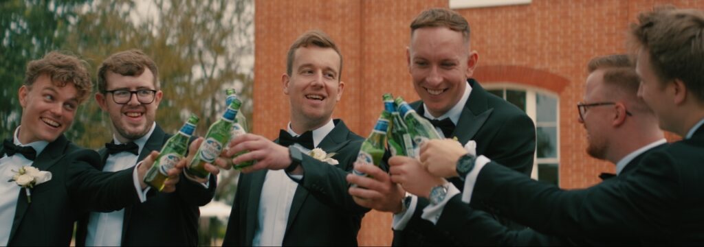 Groomsmen outside Reymerston Hall Norfolk Wedding