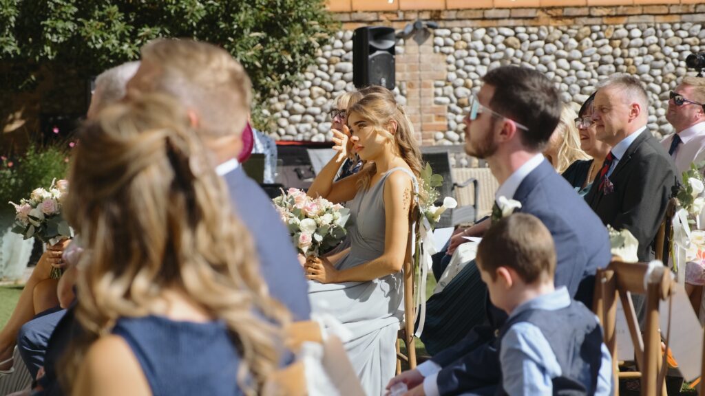 Guest crying during wedding ceremony at The Hoste Arms in Norfolk